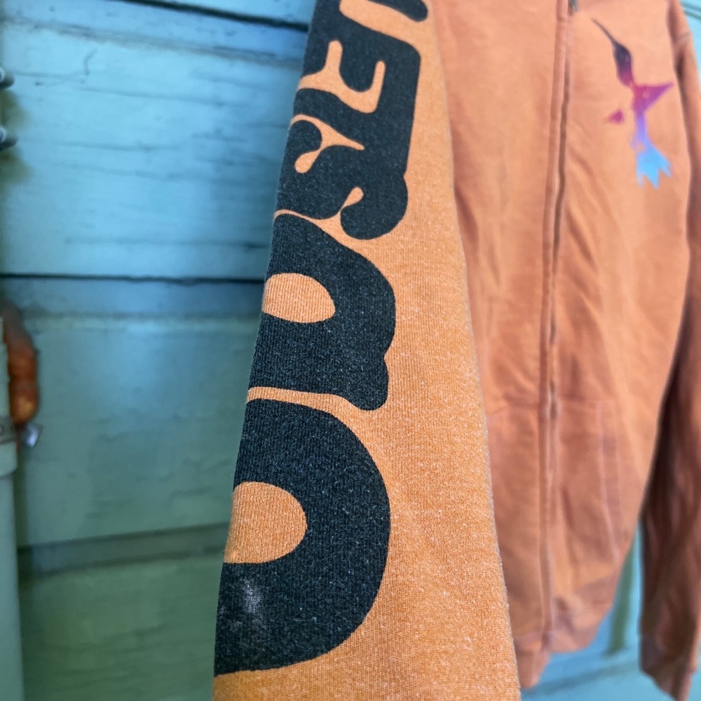 Free city Orange Zip-Up Hoodie with Bird Graphic - Picture 2 of 6